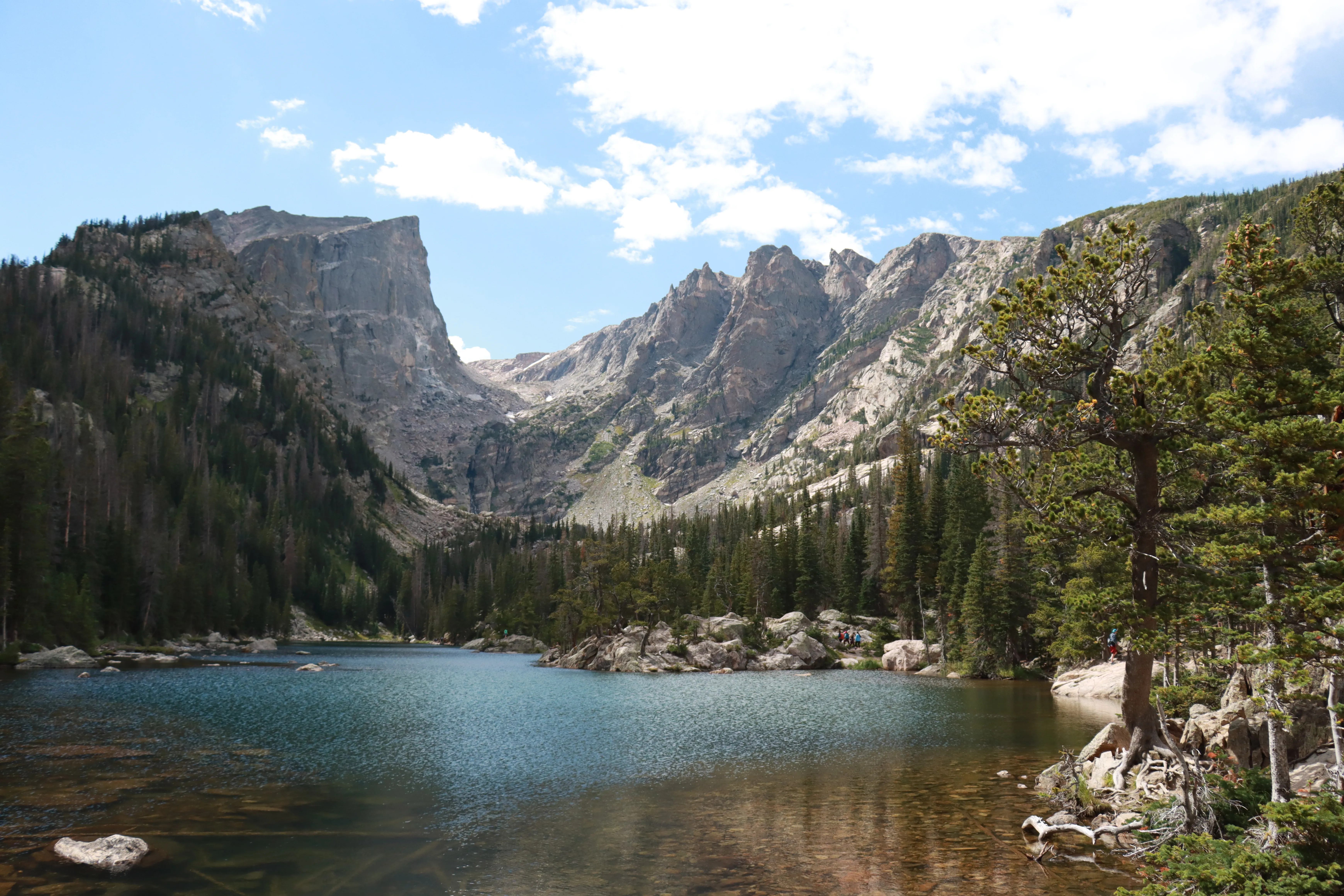Alpine lake beneath towering peaks